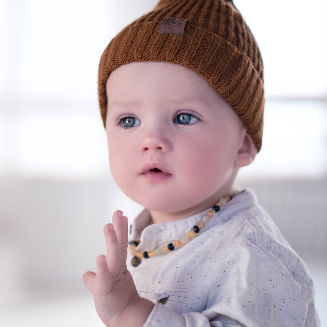 When is the Right Time for Your Baby to Start Wearing Amber Teething J