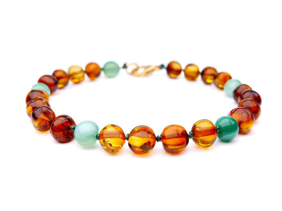 Pulsera de ámbar con cuentas redondeadas coñac