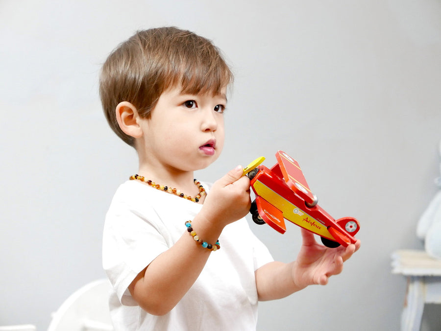 Accesorio natural para niños: pulsera de ámbar crudo multicolor con ágata azul