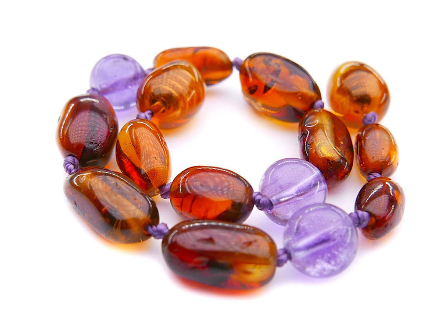 Pulsera calmante de ámbar báltico pulido color coñac y amatista para bebés