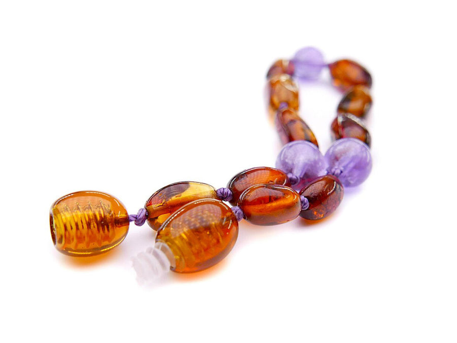 Pulsera de ámbar pulido y amatista para aliviar la dentición de bebés