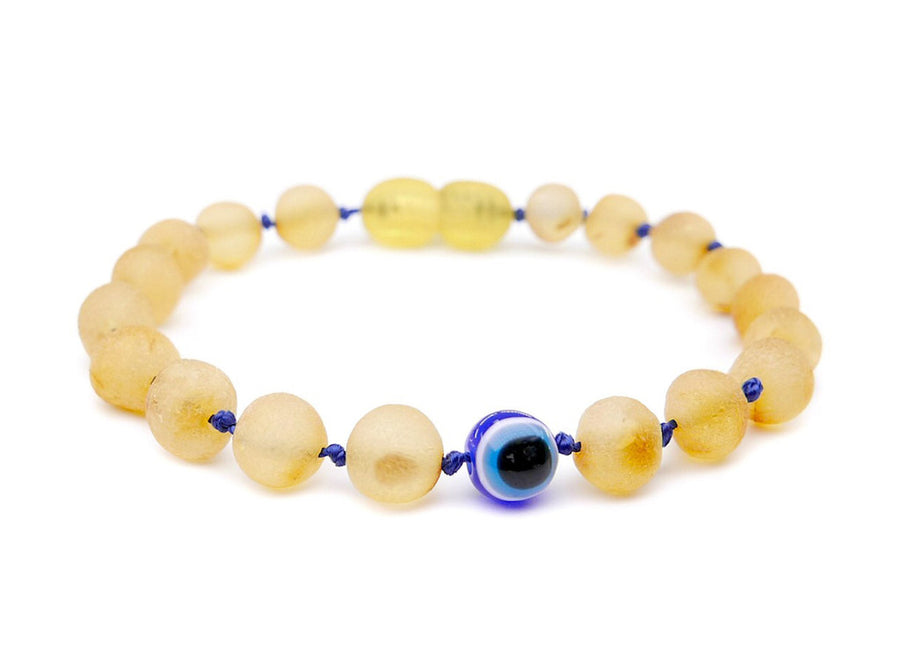 Pulsera protectora para bebé con ámbar báltico en bruto y ojo turco