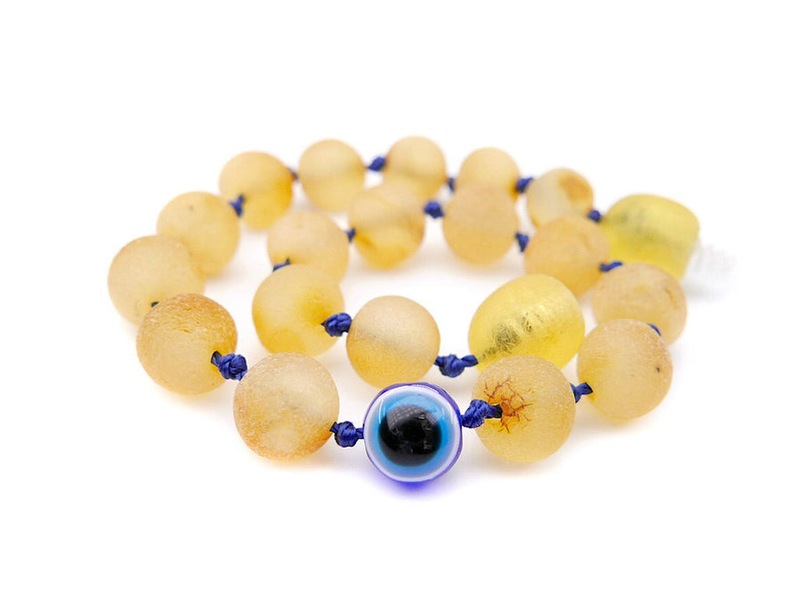 Pulsera/tobillera de ámbar miel y cuenta de ojo turco para la dentición infantil