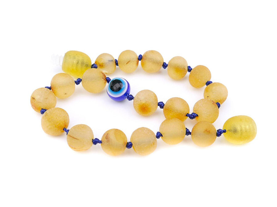 Tobillera calmante de ámbar báltico color miel con amuleto de ojo turco para niños