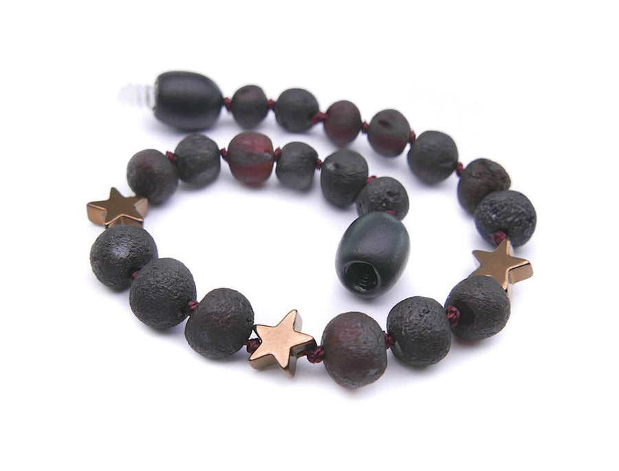 Pulsera/tobillera de dentición para bebé con ámbar en bruto y estrella de hematita