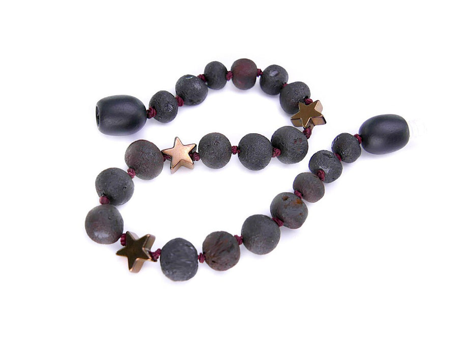 Pulsera de ámbar báltico sin pulir color cereza oscura con detalles de hematita para dentición