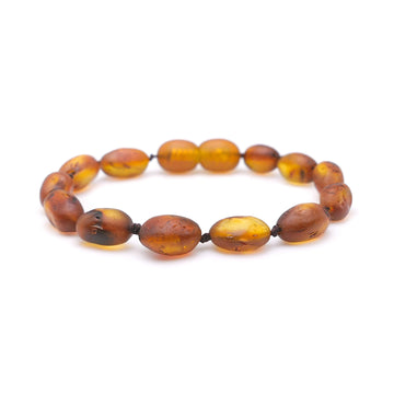 PULSERA / TOBILLERA DE ÁMBAR BÁLTICO PARA LA DENTICIÓN CON CUENTAS DE ÁMBAR COGNAC SIN PULIR PARA TU BEBÉ