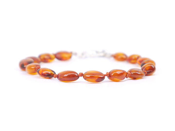 Pulsera ajustable de ámbar cognac pulido para la dentición de bebé, alivio natural