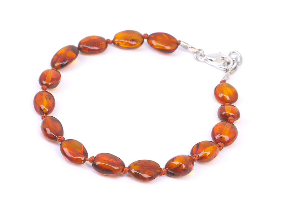 Pulsera/tobillera para bebé con cuentas de ámbar cognac pulido, diseño seguro y natural