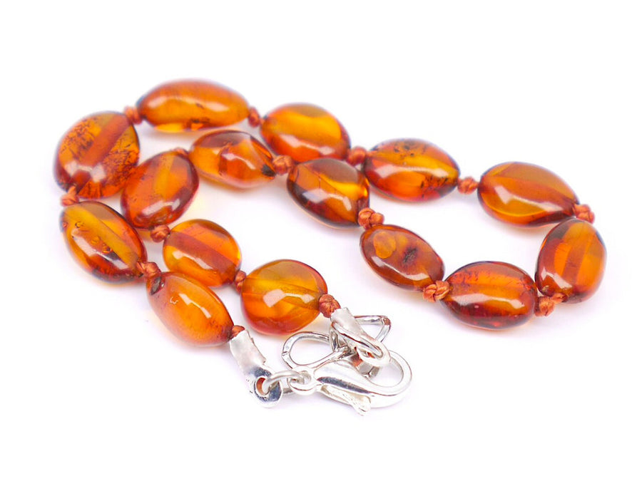 Tobillera ajustable de ámbar báltico cognac pulido, perfecta para aliviar la dentición