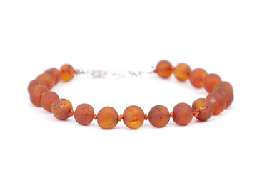 Pulsera ajustable de ámbar báltico crudo coñac para la dentición de bebés