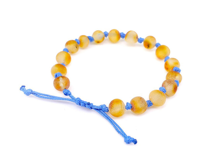 Pulsera natural para dentición en ámbar báltico color miel para bebés