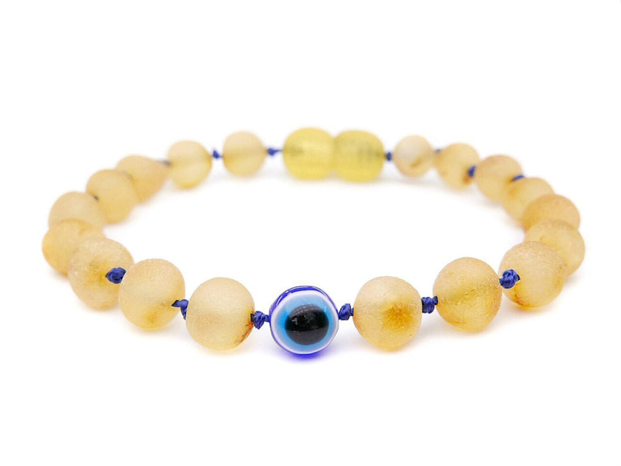 Pulsera de dentición de ámbar báltico en bruto color miel con cuenta de ojo turco para bebé