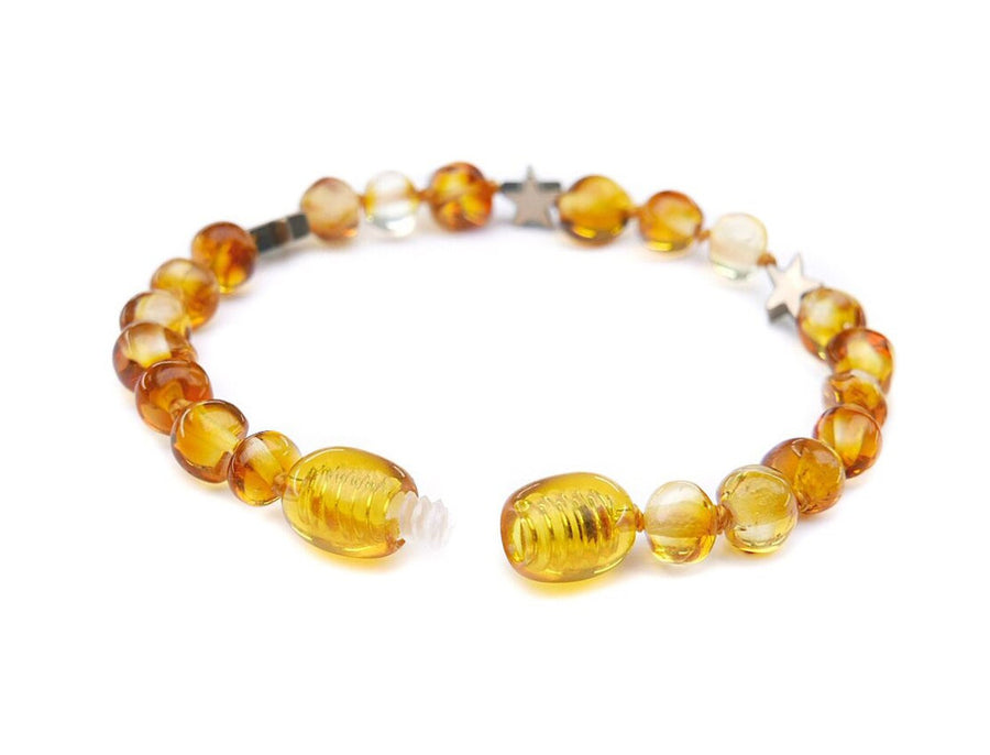 Pulsera de dentición de ámbar y estrella de hematita, ideal para aliviar molestias en bebés