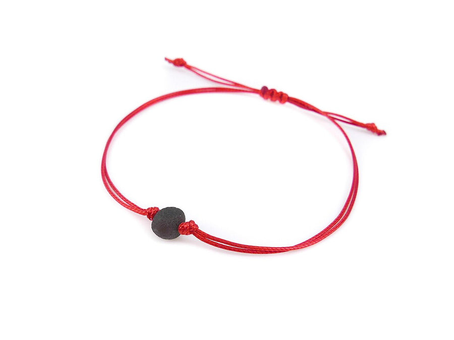 Pulsera protectora de hilo rojo con cuentas de ámbar 100% natural