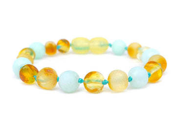 Pulsera de dentición de ámbar báltico en bruto color miel con amazonita azul para bebé