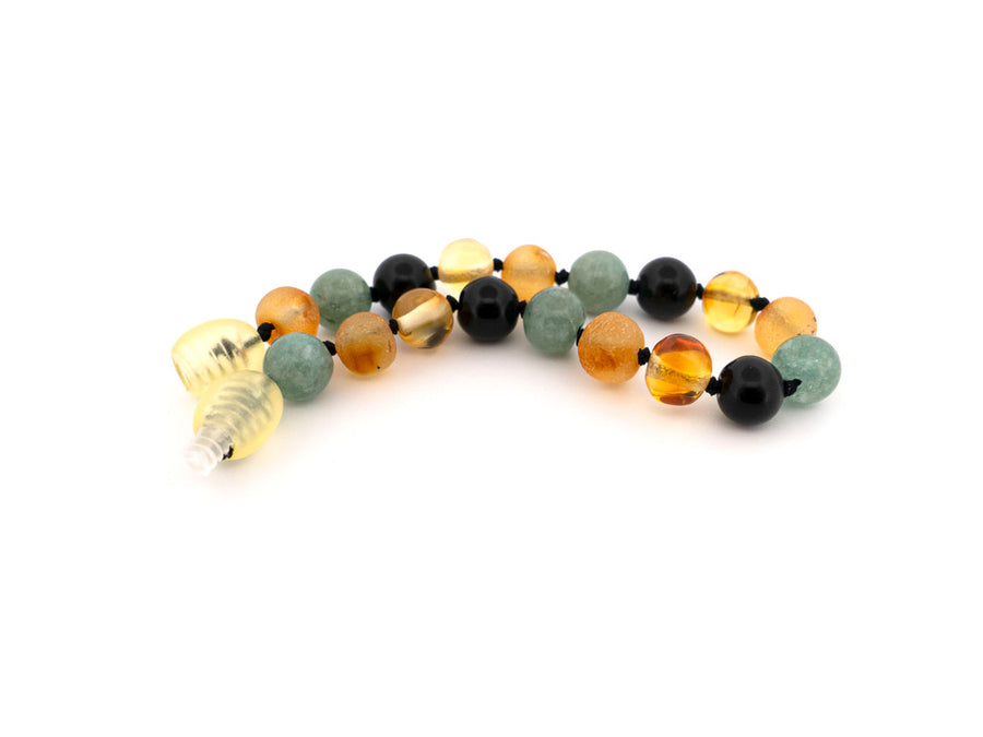 Pulsera calmante de ámbar, jade y obsidiana, perfecta para aliviar molestias de la dentición