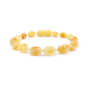 Pulsera de ámbar para dentición con cuentas oliva sin pulir color caramelo blanco