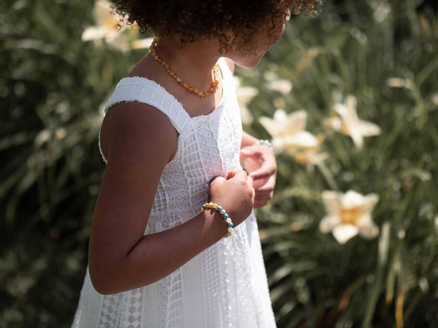 Pulsera natural para bebé de ámbar báltico sin pulir y cuentas de turquesa