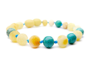 Pulsera de dentición de ámbar báltico en bruto color butterscotch con turquesa para bebé