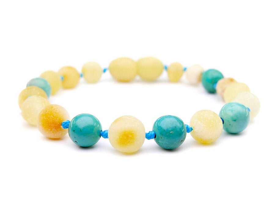 Pulsera para bebé con cuentas de ámbar en bruto color miel y turquesa