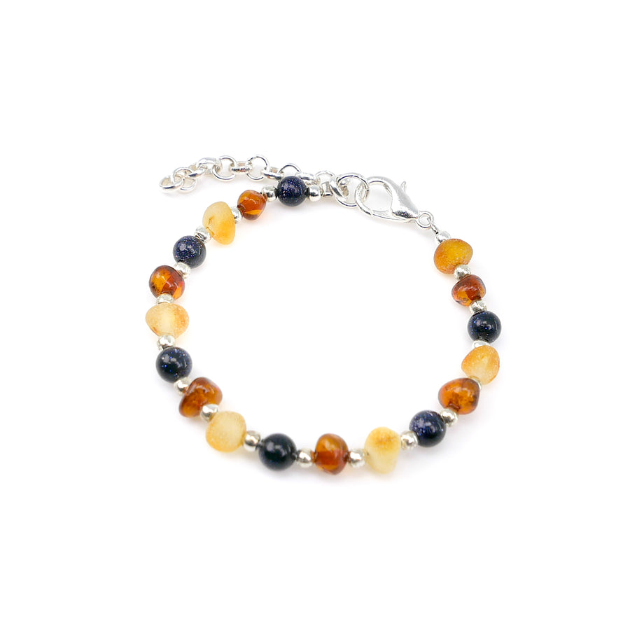 Pulsera de ámbar para bebé con propiedades calmantes y piedra azul