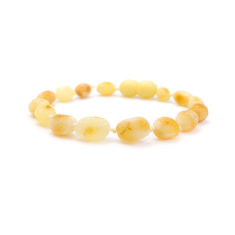 Pulsera de dentición hecha a mano con ámbar báltico crudo en forma de oliva