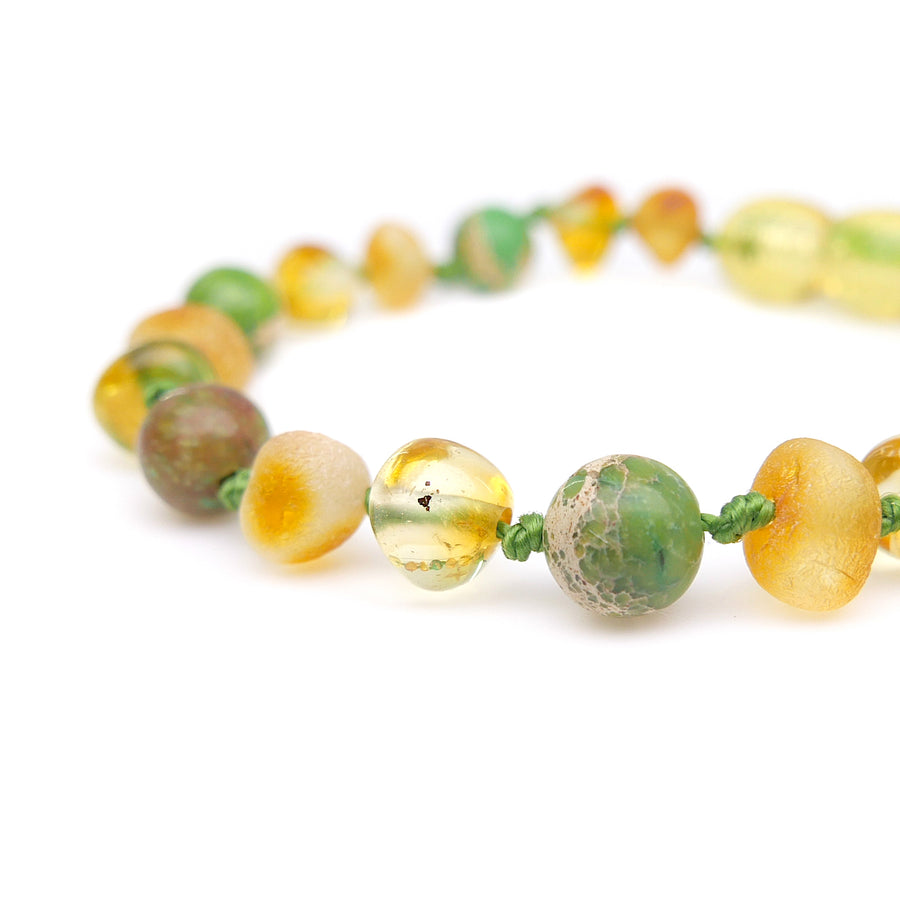 Pulsera de dentición con ámbar miel y cuentas energéticas de jaspe
