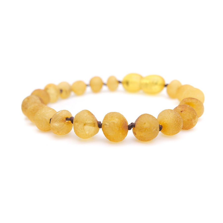 Pulsera artesanal de dentición con ámbar báltico miel sin pulir