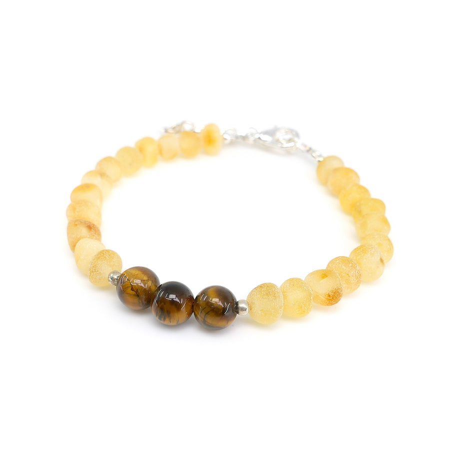 Joyería infantil con ámbar crudo miel y cuentas de ojo de tigre para niños Tauro