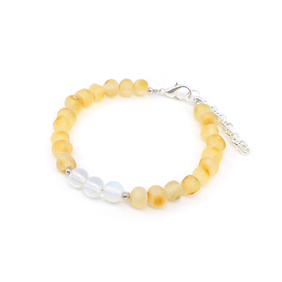 Pulsera artesanal infantil de ámbar y piedra luna para armonía y bienestar