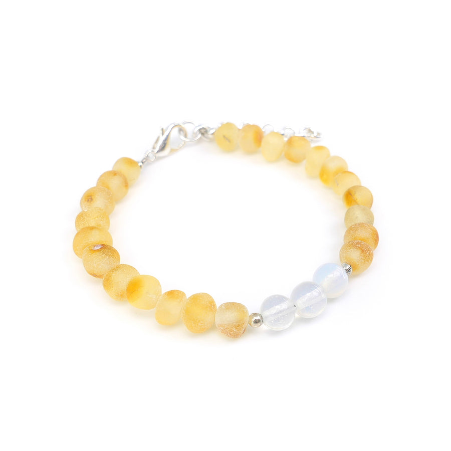 Joyería para niños con ámbar miel y piedra luna, ideal para energía femenina