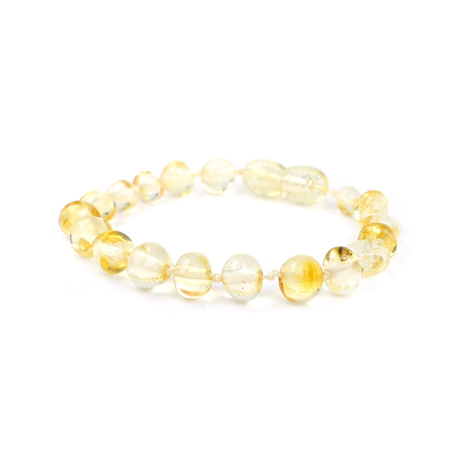 Pulsera artesanal de dentición para niños con ámbar báltico pulido en tono limón