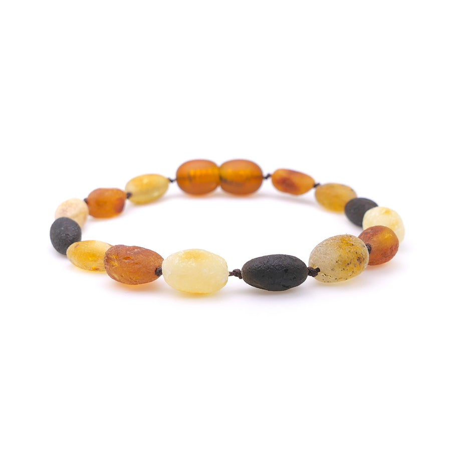 Pulsera infantil de ámbar báltico crudo multicolor con cuentas ovaladas