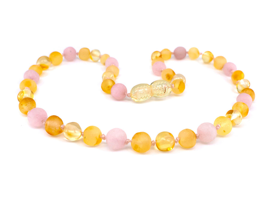 Collar de dentición de ámbar con cuentas rosas