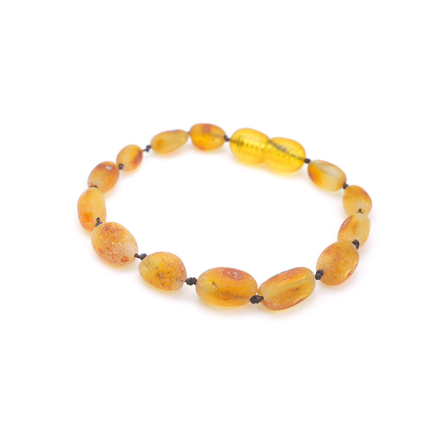 Accesorio de dentición hecho a mano con ámbar báltico amarillo caramelo