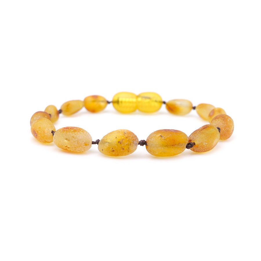 Pulsera de ámbar sin pulir para bebé con cuentas ovaladas color caramelo