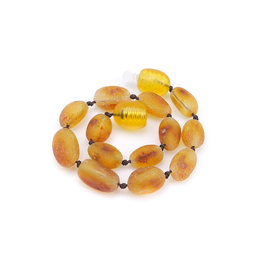 Tobillera de ámbar natural para bebé en tono caramelo sin pulir