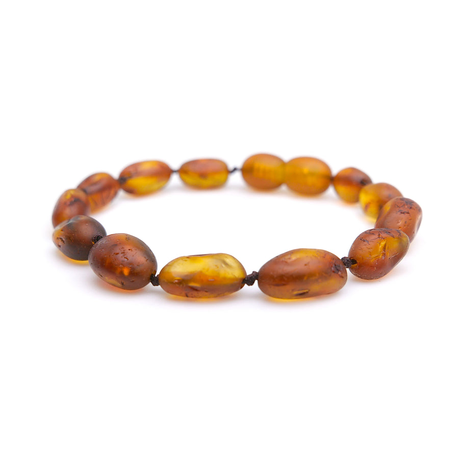 PULSERA / TOBILLERA DE ÁMBAR BÁLTICO PARA LA DENTICIÓN CON CUENTAS DE ÁMBAR COGNAC SIN PULIR PARA TU BEBÉ