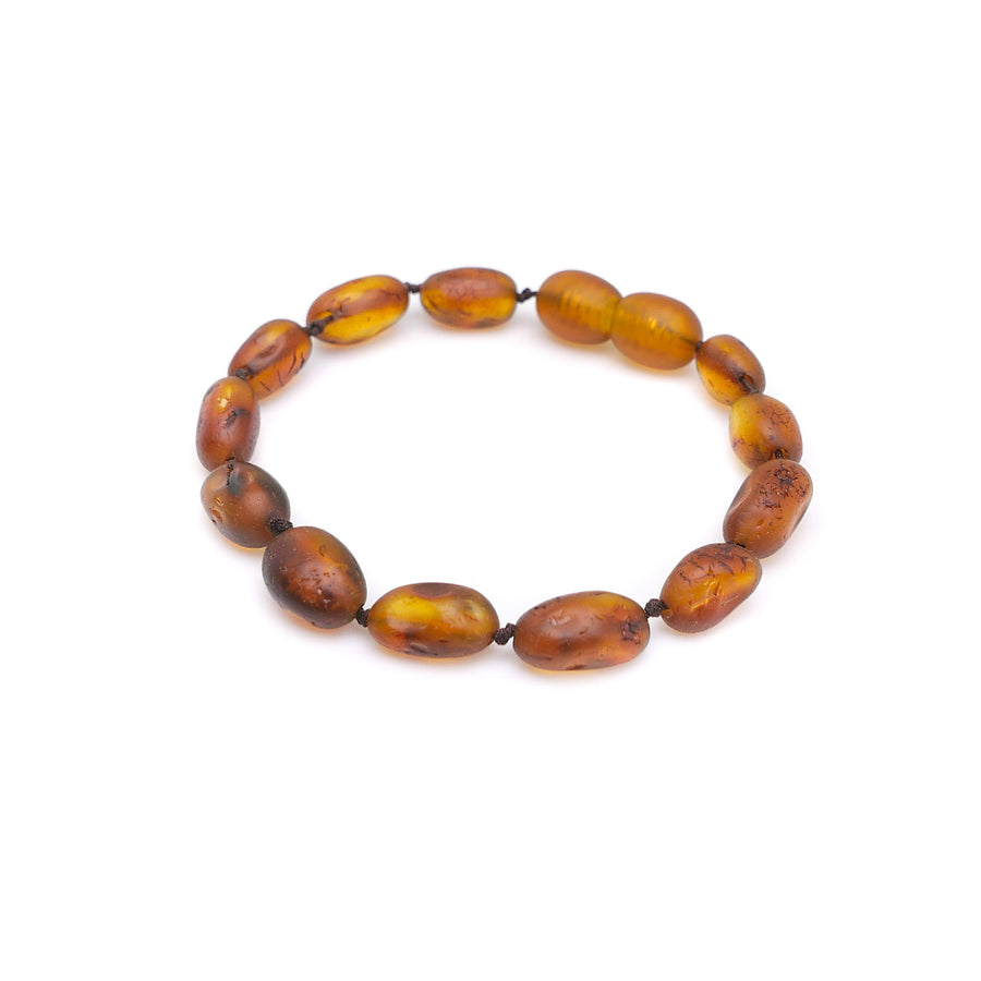 PULSERA / TOBILLERA DE ÁMBAR BÁLTICO PARA LA DENTICIÓN CON CUENTAS DE ÁMBAR COGNAC SIN PULIR PARA TU BEBÉ