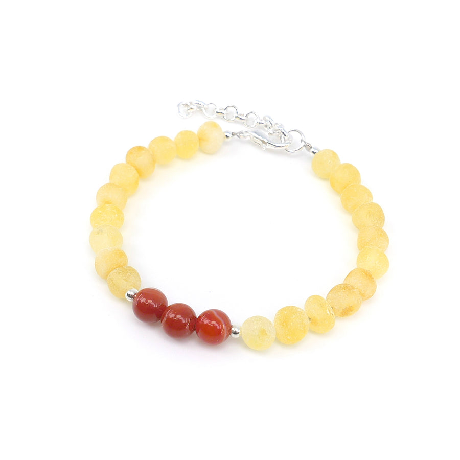 Pulsera natural para niños con ámbar báltico y cornalina, símbolo de vitalidad