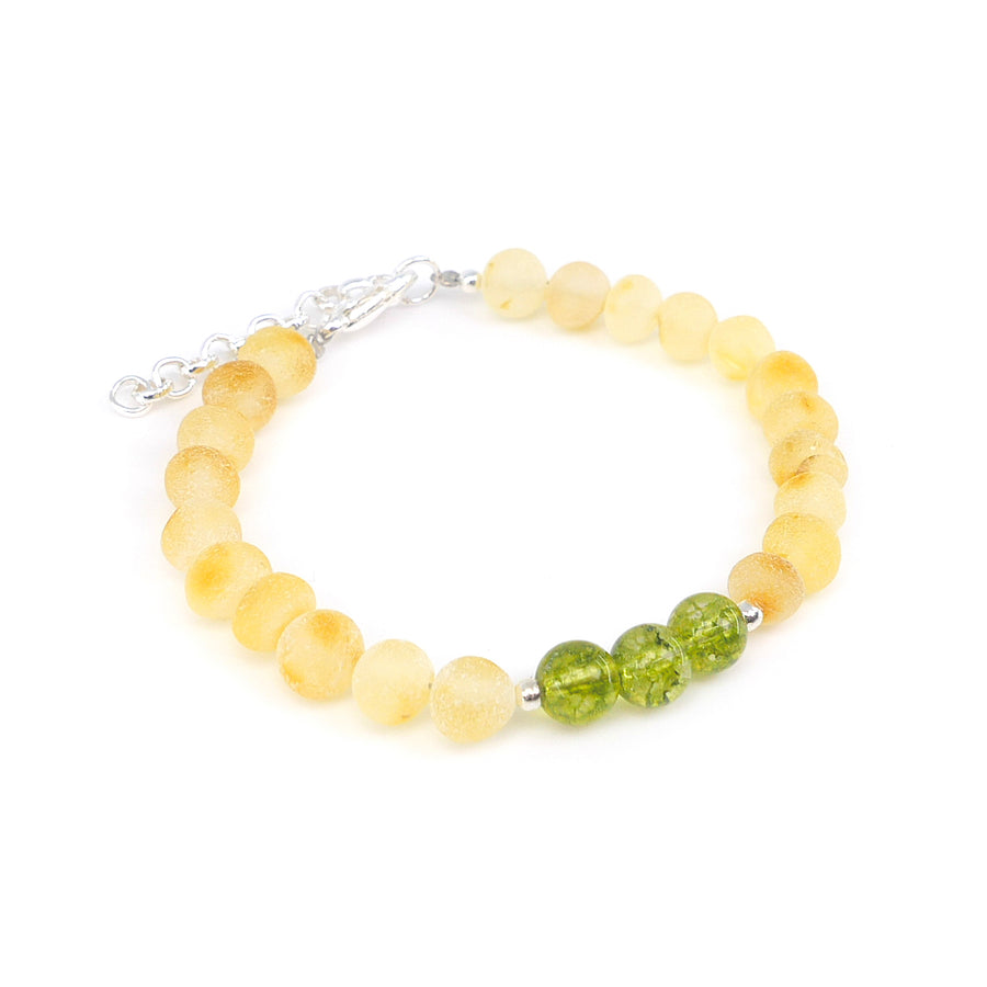 Pulsera infantil de ámbar báltico y peridoto, ideal para equilibrio emocional
